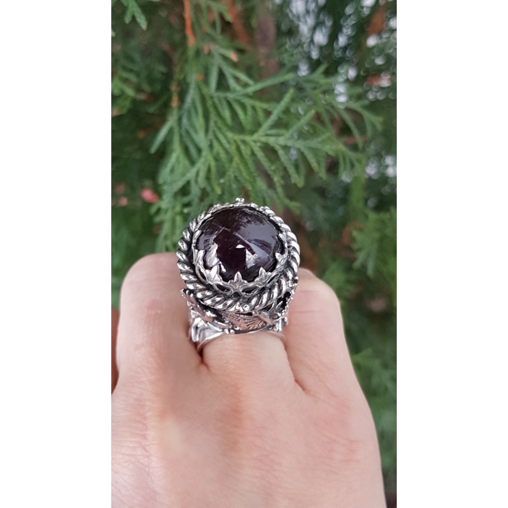 Sterling silver ring with natural star garnet