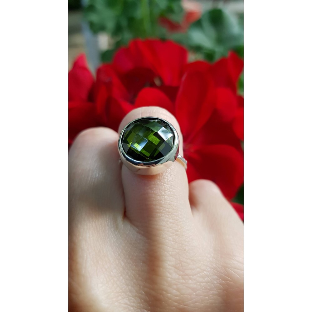Sterling silver ring with green crystal