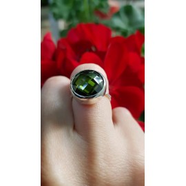 Sterling silver ring with green crystal