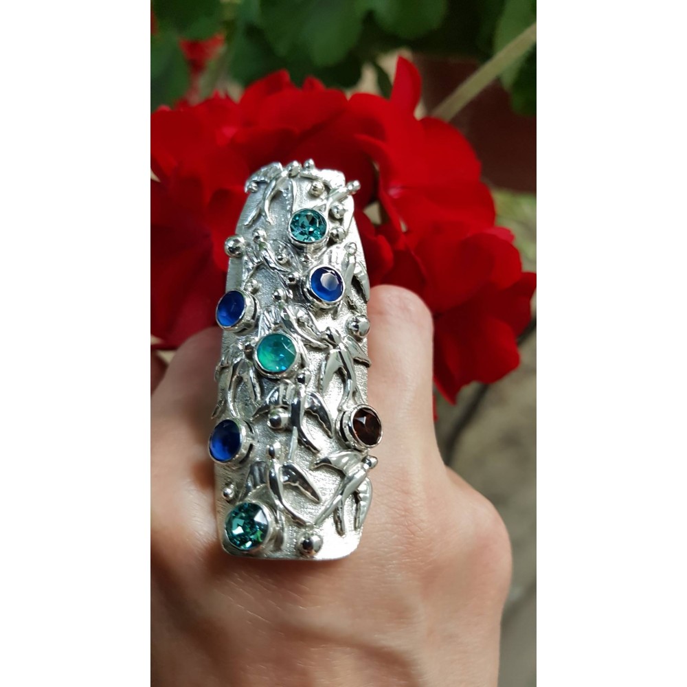 Sterling silver ring with natural crystals Peacocking