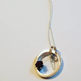 Sterling silver pendant and red garnet