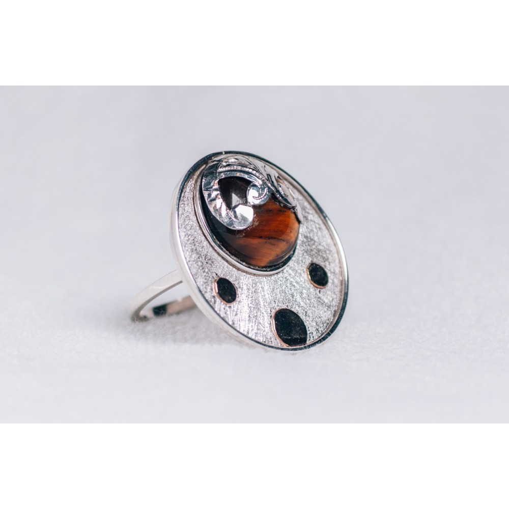 Large sterling silver ring with cabochon hazel Tiger’s eye and three gold rounds
